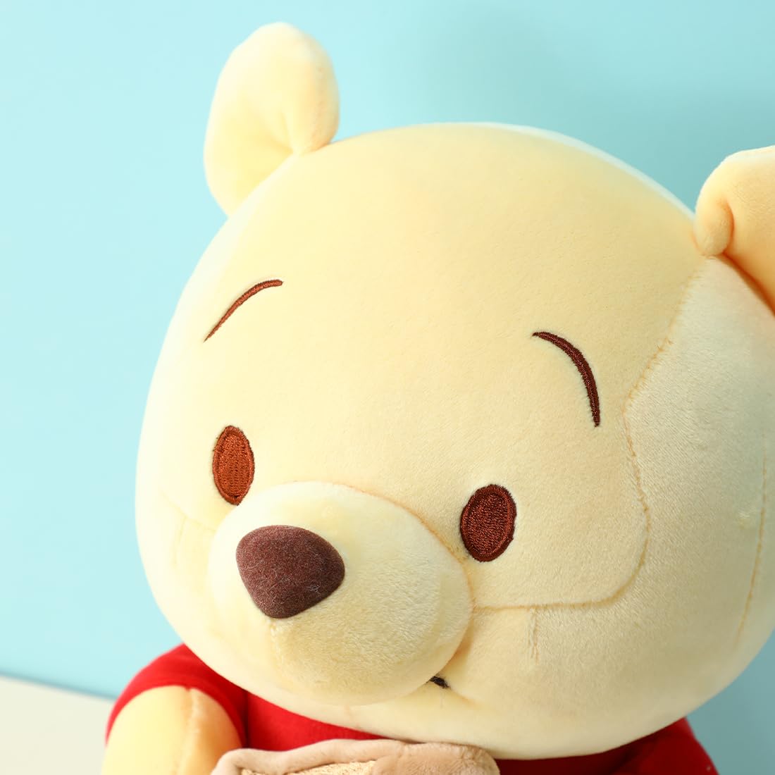 MINISO Winnie-The-Pooh Stuffed Animals Plush Toy Sitting Holding Biscuits, Soft Cute Ideal Gift Doll for Sleeping and Decoration